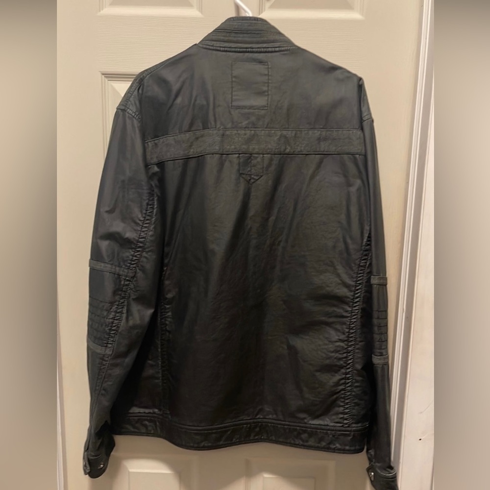 Men’s black jacket
 please see white tag for description